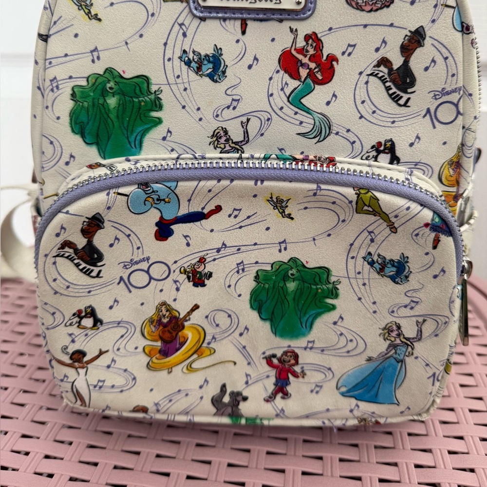 Disney 100 year Loungefly Cream Backpack with Disney Characters